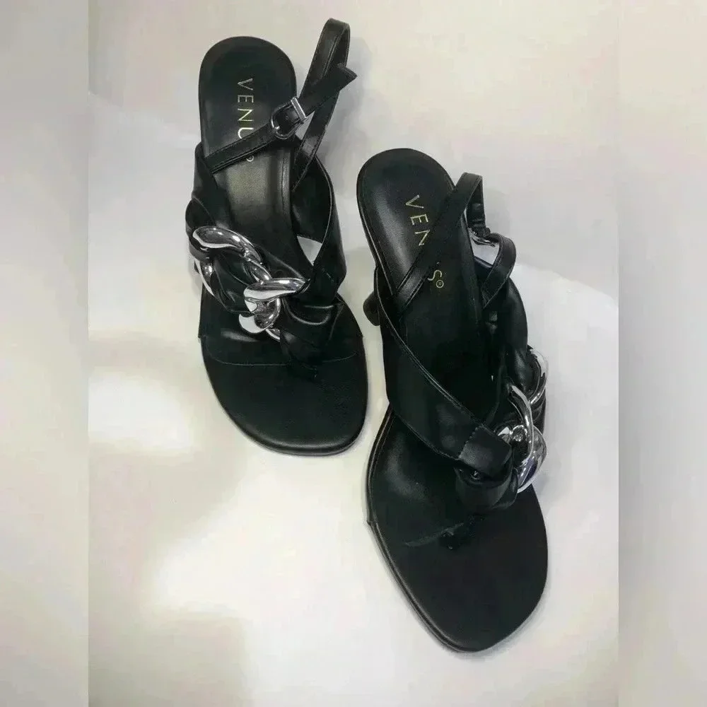 Black and silver heels size 7.5